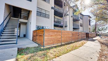 Exterior staircase and wooden perimeter fencing